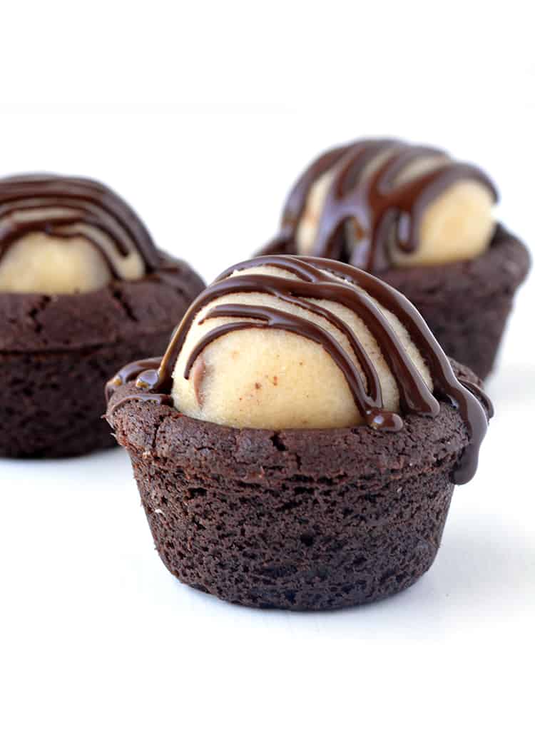 Chocolate cookie cups filled with milk chocolate cookie dough