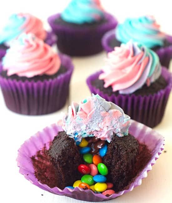 M&M Surprise Cupcakes with Rainbow Frosting
