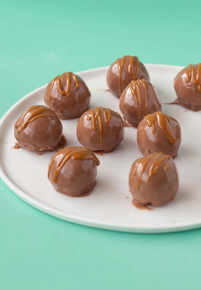 A white plate of Cookie Butter Truffles