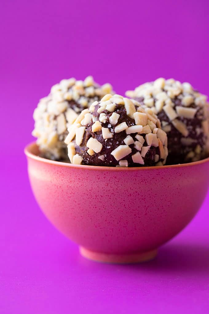 A pink bowl filled with homemade Nutella Truffles
