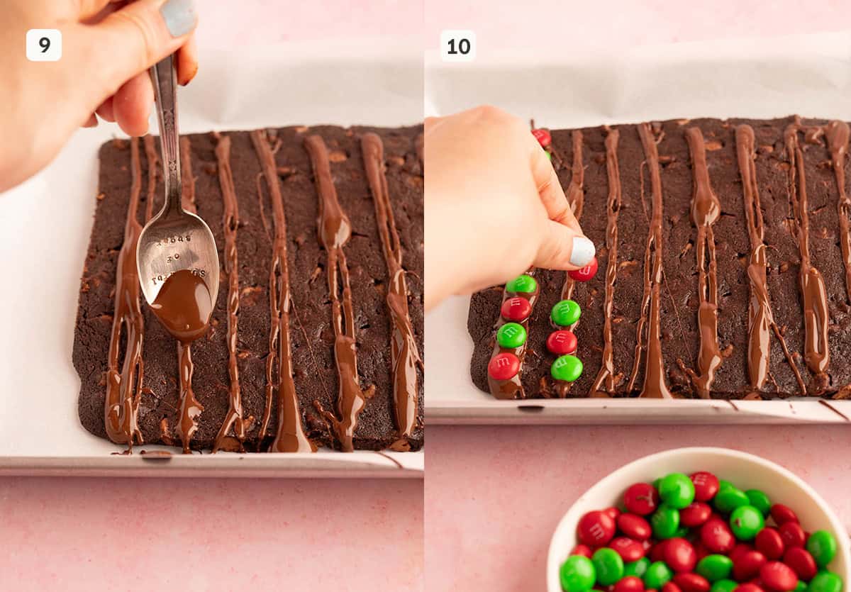 A hand drizzling chocolate on brownie brittle and adding M&M's.