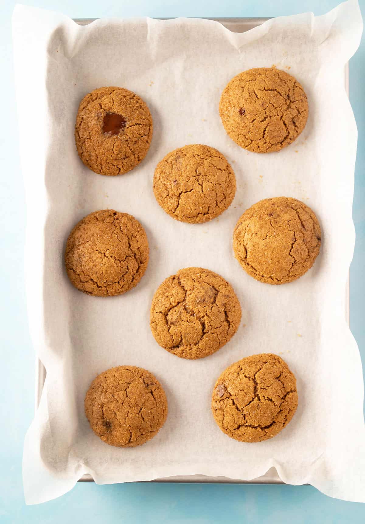 Fresh out of the oven Molasses Cookies cooling. 