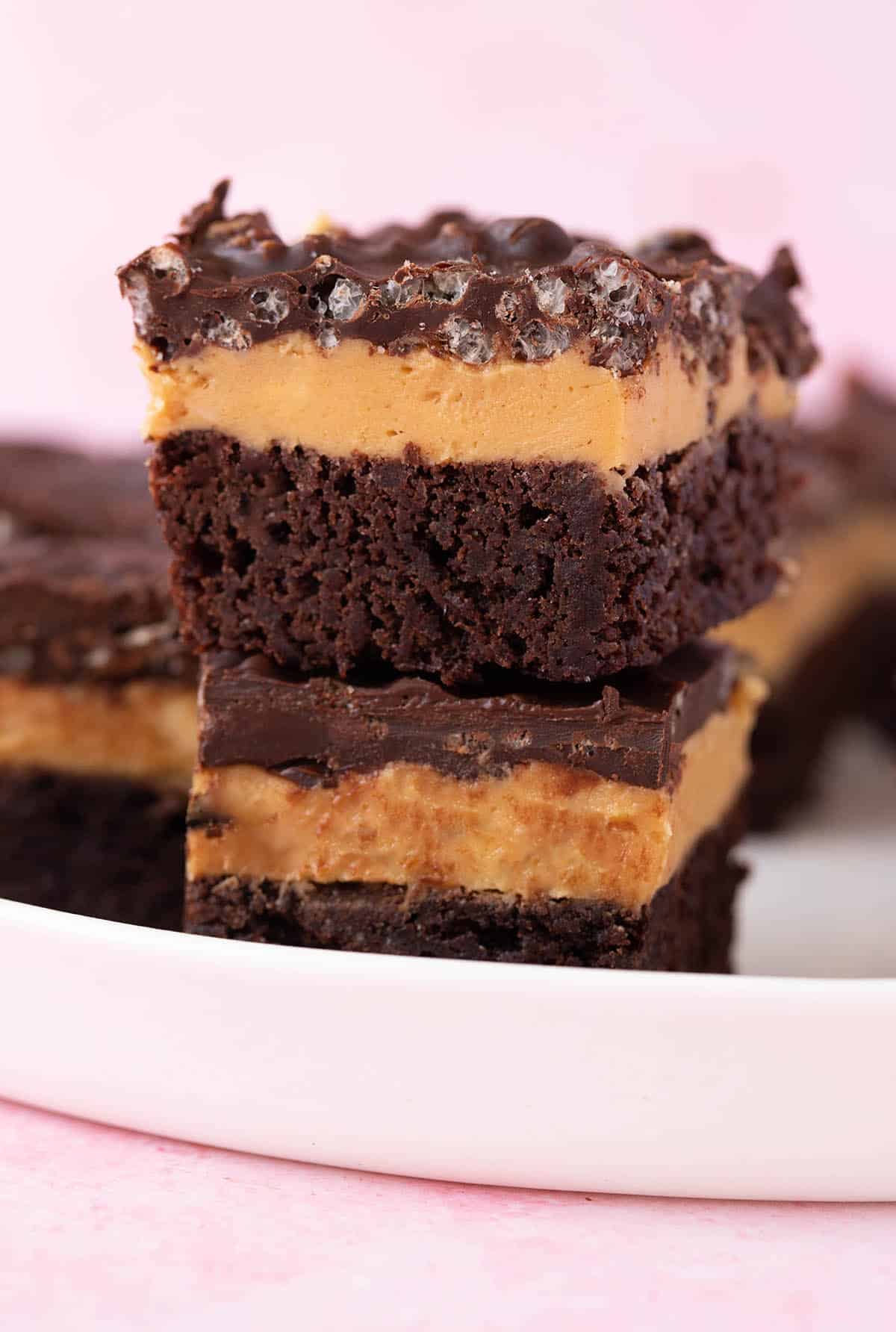 Peanut Butter Brownie Bars sitting on a white plate.