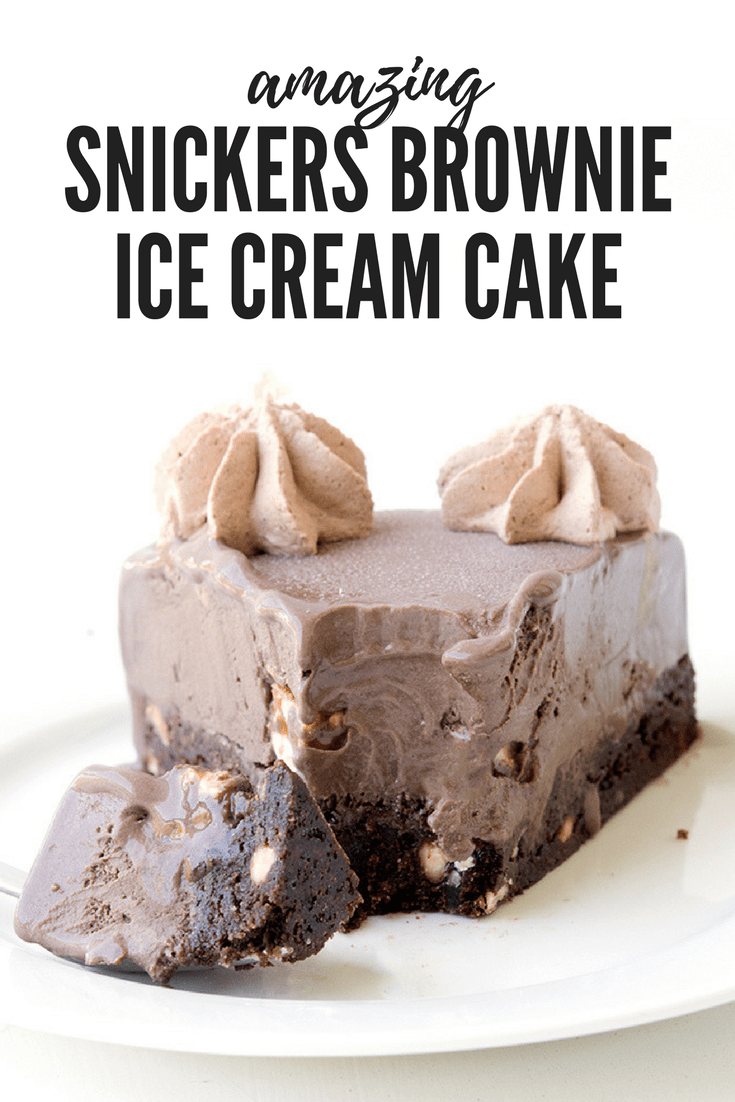 The BEST cake ever! Fudgy chocolate brownie topped with creamy chocolate ice-cream and lots of Snickers bars! Recipe from sweetestmenu.com #dessert #snickers #icecream #cake