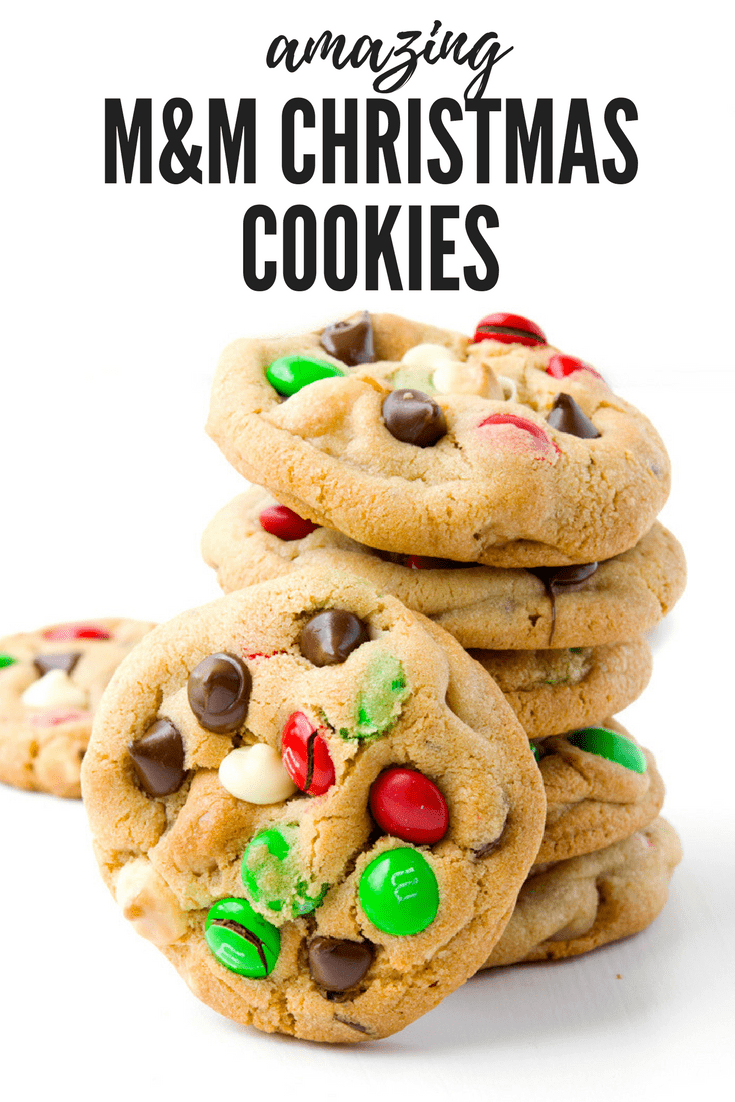 Soft and chewy cookies stuffed with M&M's, white chocolate chips, milk chocolate chips and roasted macadamias! These cookies are perfect for Christmas! Recipe from sweetestmenu.com #cookies #candy #Christmas #chocolatechip #macadamias