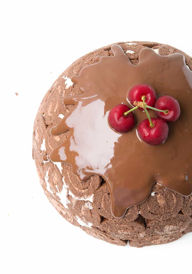 Chocolate Ice Cream Pudding Bombe topped with fresh cherries