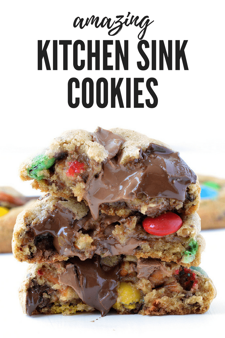 Amazing Kitchen Sink Cookies packed with pecans, pretzels, M&M's and two types of chocolate. These thick and chewy cookies really are amazing! Recipe from sweetestmenu.com #cookies #chocolate #mms #pretzels #pecans #candy