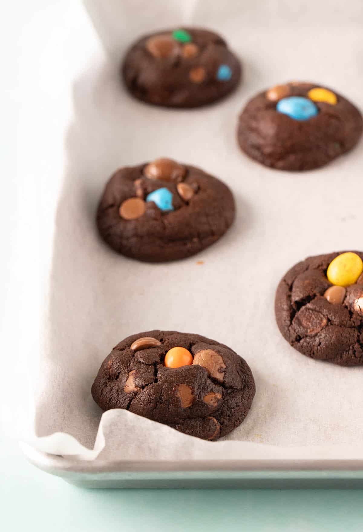 A baking tray with fresh out of the oven cookies ready for Easter.