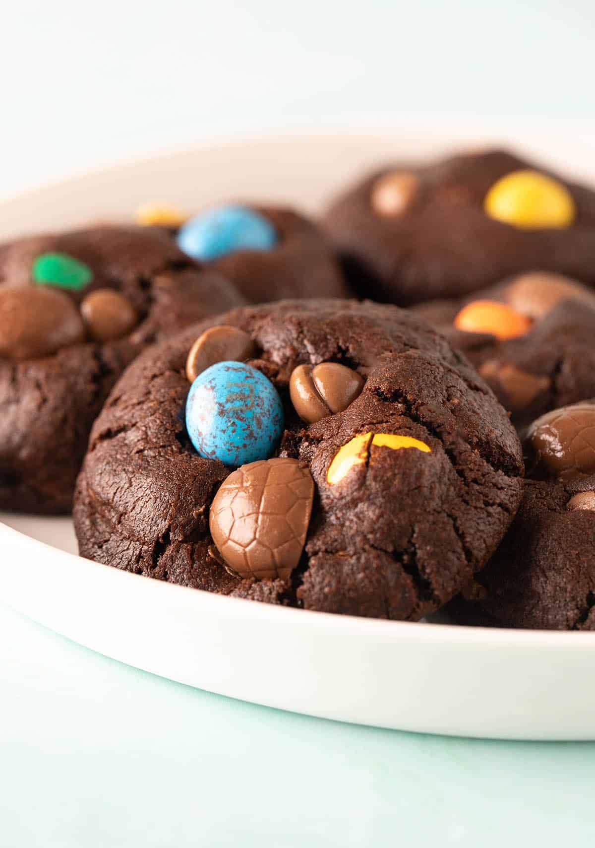 A plate of homemade chocolate Easter Egg Cookies.