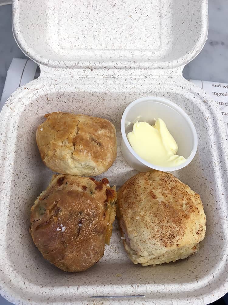 Three biscuits with a serving of butter