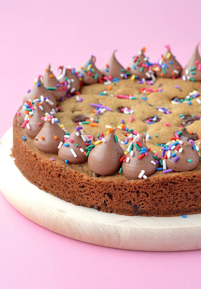 A Giant Chocolate Chip Cookie Cake decorated with sprinkles