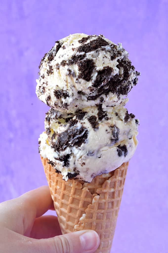 Two scoops of Oreo Ice Cream in a waffle cone