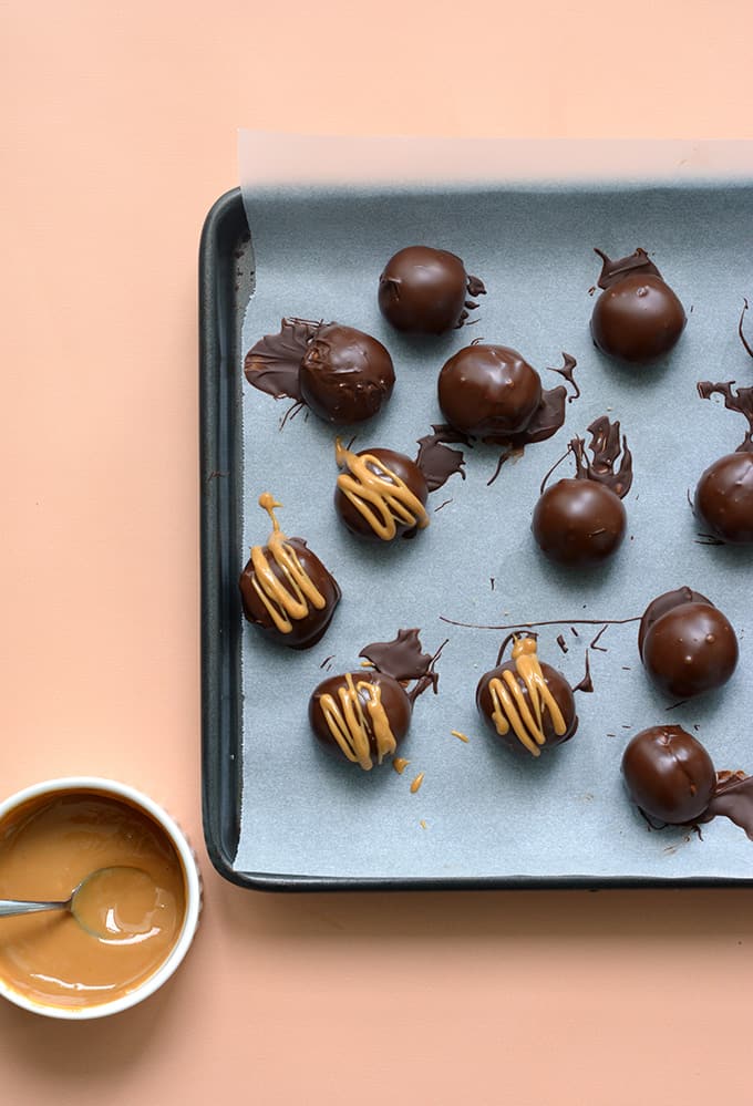 A tray of chocolate-dipped peanut butter truffles