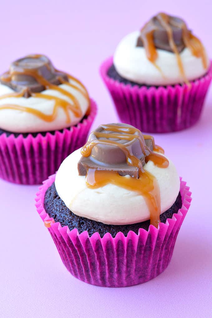 Salted Caramel Chocolate Cupcakes on a purple background