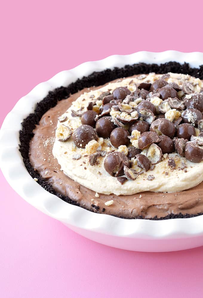 Chocolate Malt Mousse Pie on a pink background