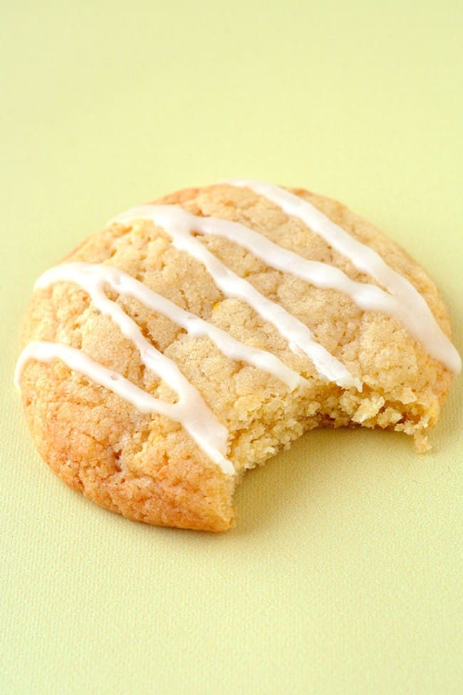 Close up of a lemon cookie on a yellow background