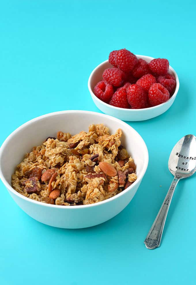 A bowl of homemade granola with fresh berries