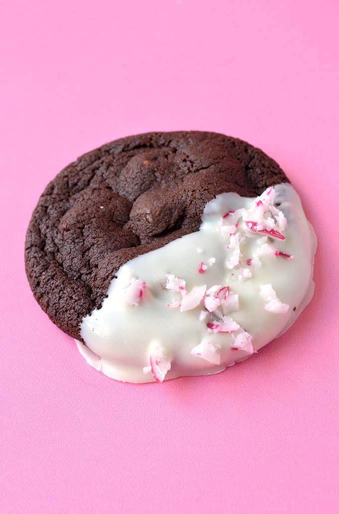 A close up of a Peppermint Chocolate Cookie sprinkled with candy canes