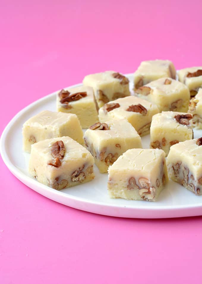 Pieces of homemade White Chocolate Fudge on a white plate