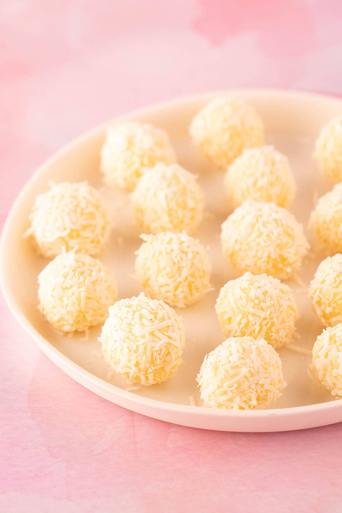 White Chocolate Truffles on a white plate.