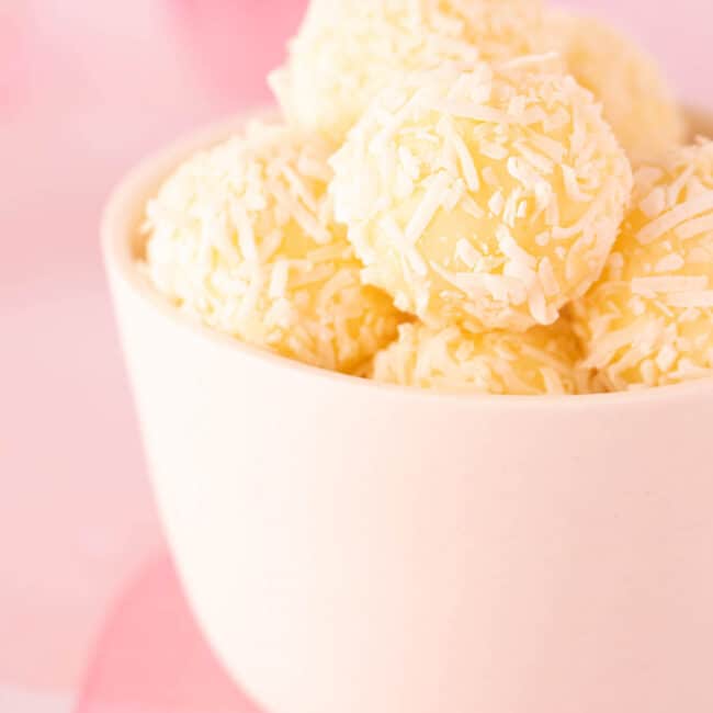 White Chocolate Coconut Truffles in a white bowl.