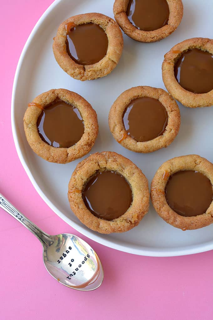 Top view of a homemade cookie cups filled with caramel 
