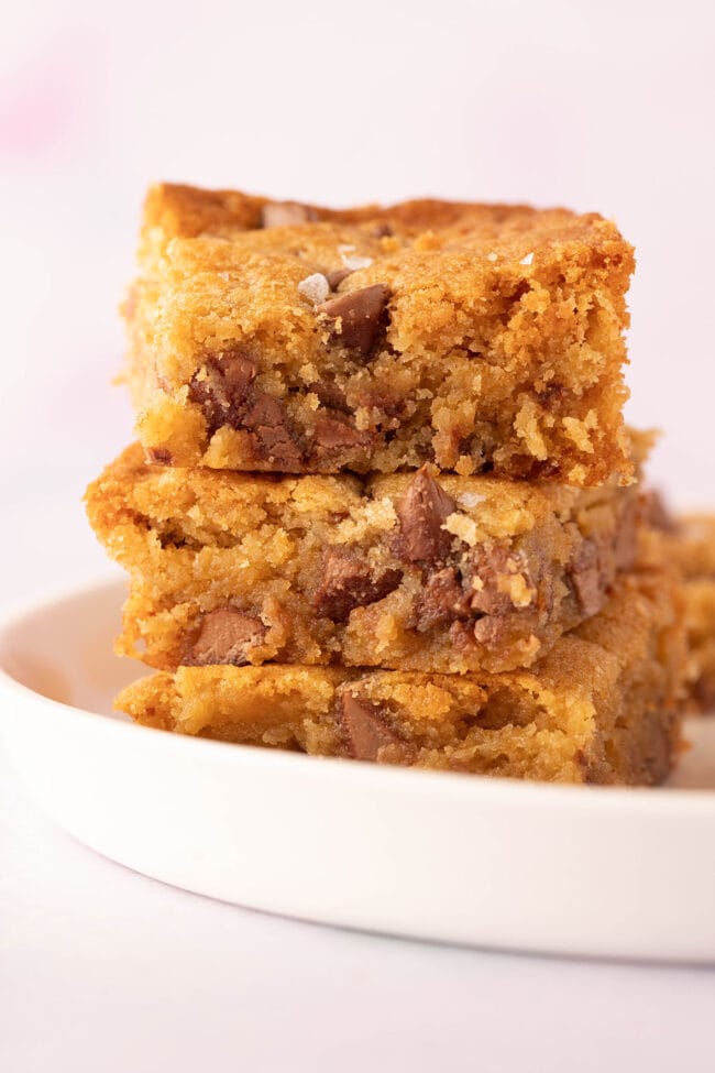 A tall stack of Congo Bars on a white plate.