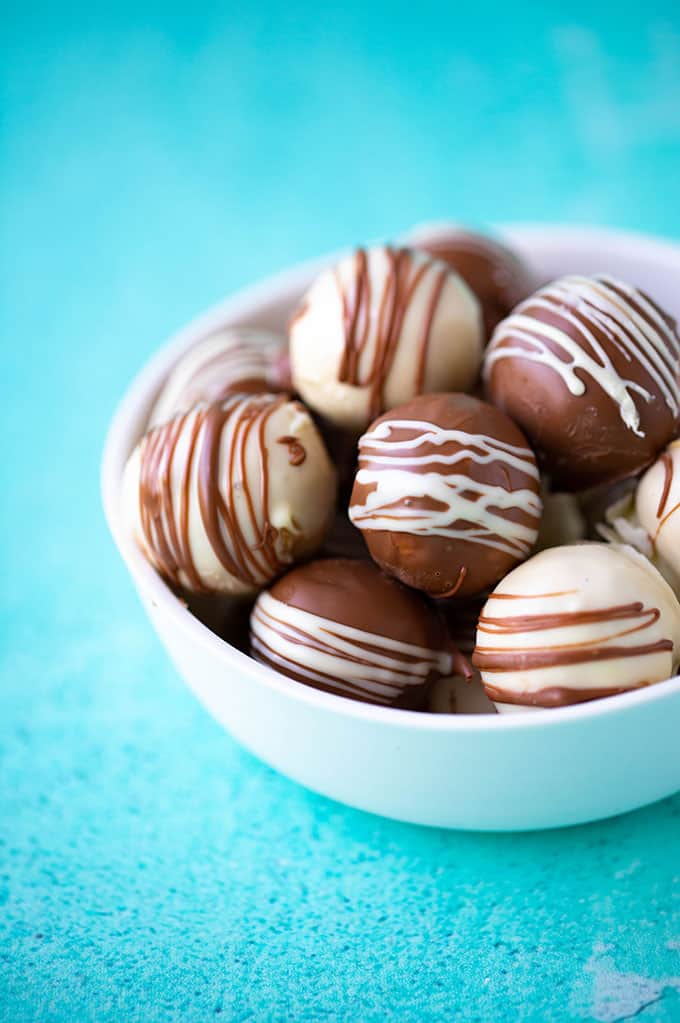A white bowl filled with Peanut Butter Truffles