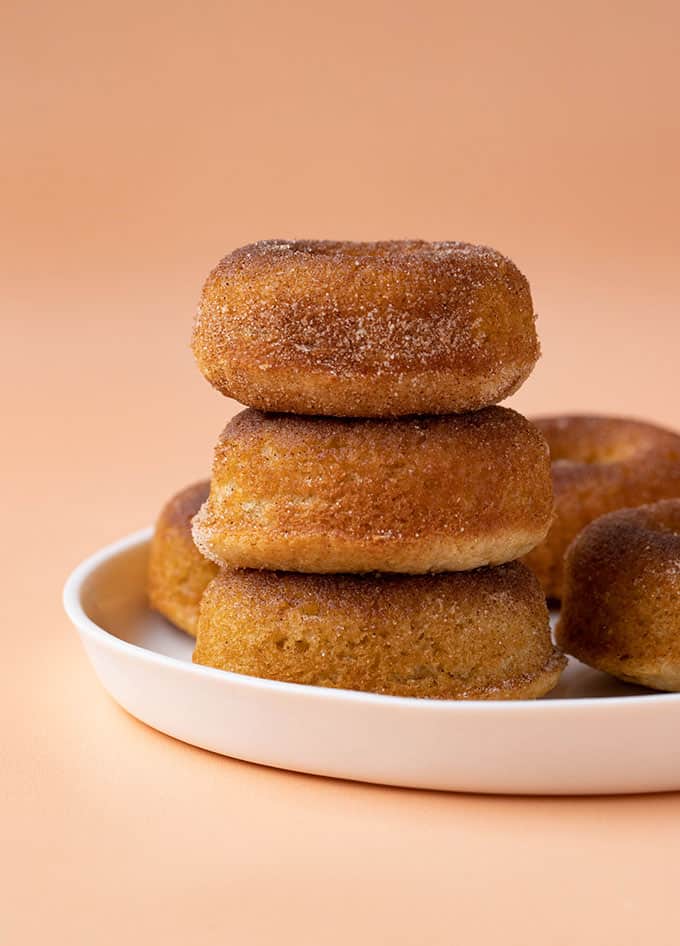 Homemade Baked Cinnamon Sugar Donuts on a white plate