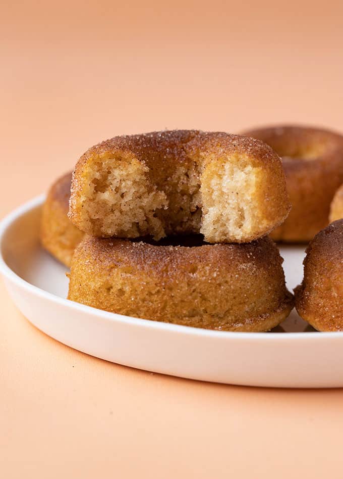 Cinnamon Donuts with a bite taken out of it