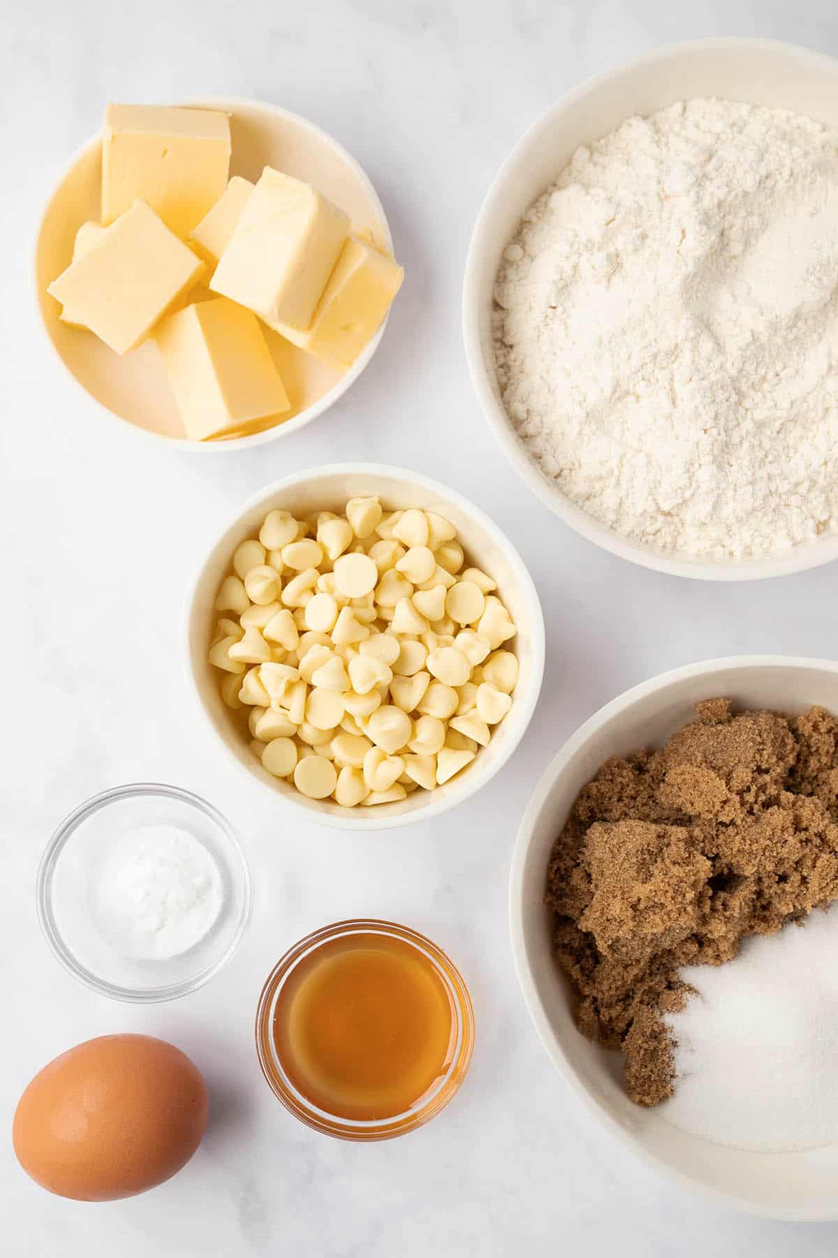 All the ingredients needed to make White Chocolate Chip Cookies from scratch.