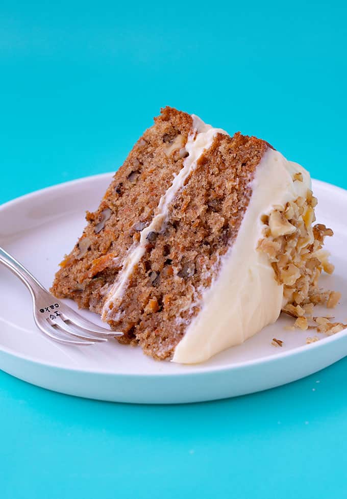 A slice of Carrot Cake on a white plate