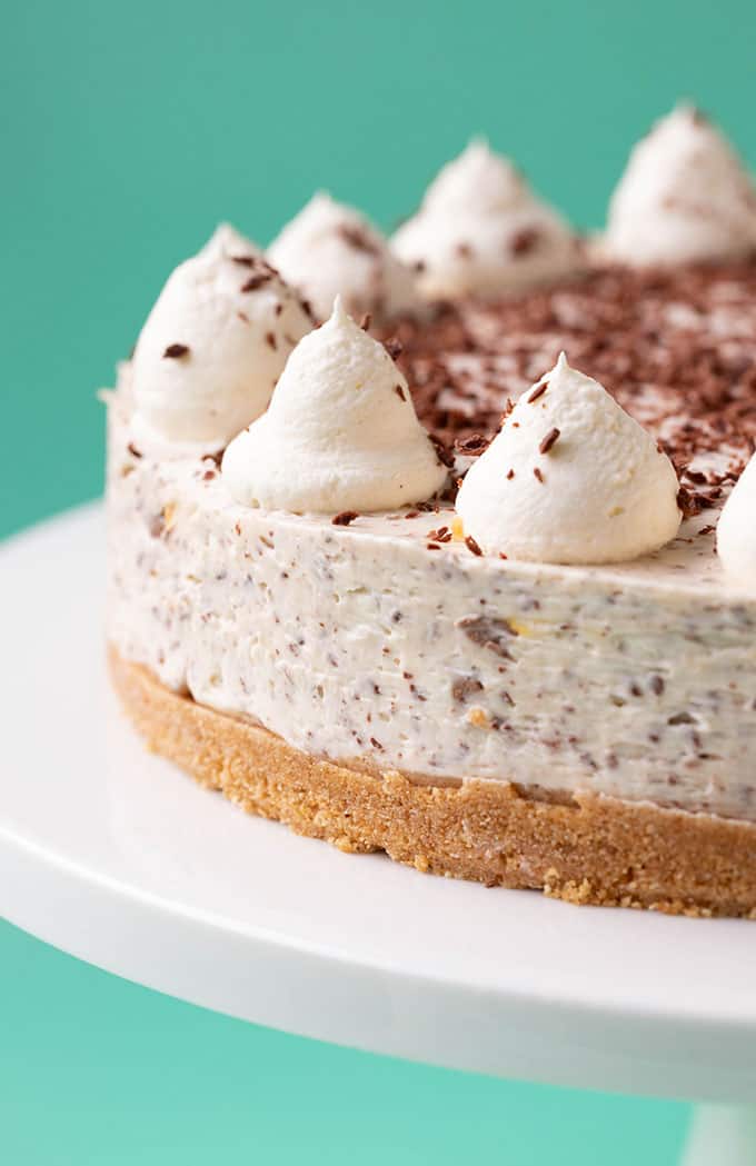 Close up of a Mini Egg Cheesecake topped with whipped cream
