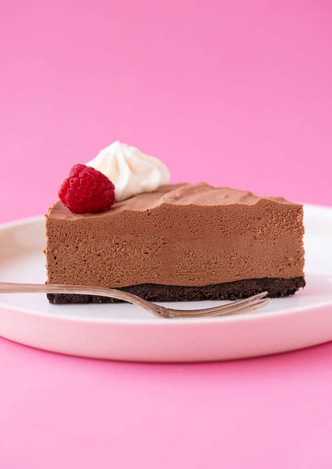 A piece of Chocolate Mousse Cake on a white plate