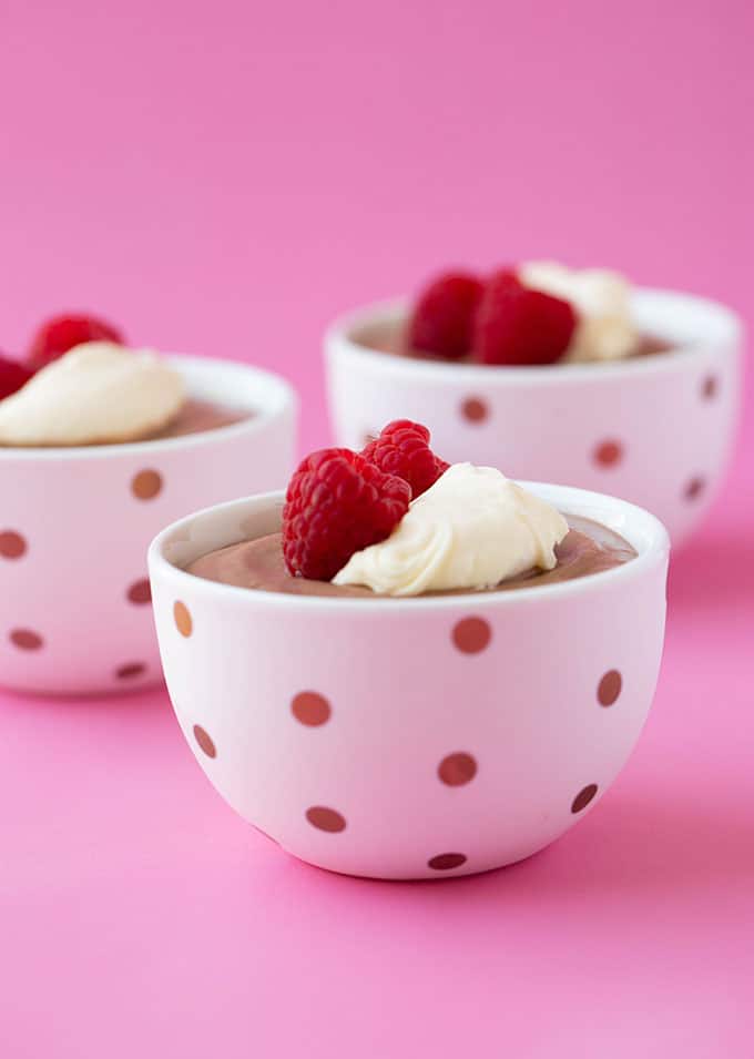 Little pots of Nutella Mousse toped with raspberries