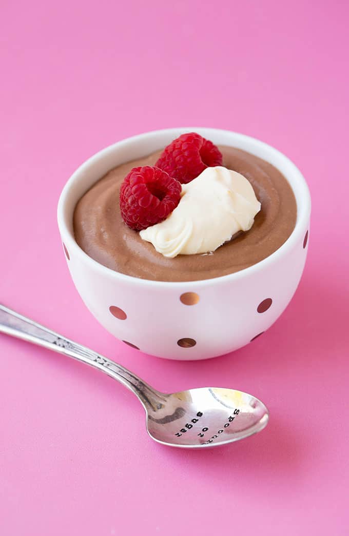 Small bowl of Nutella Chocolate Mousse topped with cream and berries