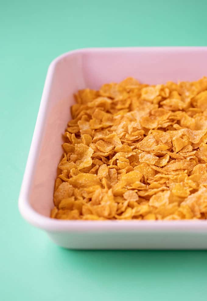A pink tray of a Cornflakes