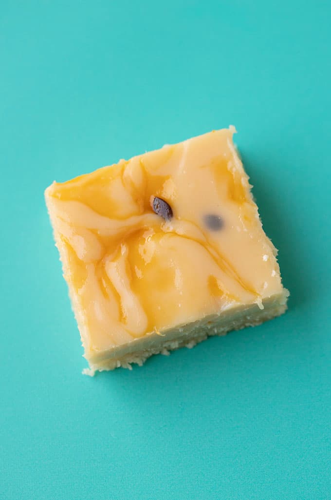Close up view of a piece of Passionfruit Slice