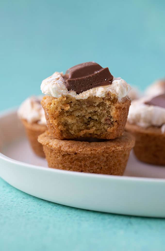 A stack of homemade Smores Cookie Cups with a bite taken out of it
