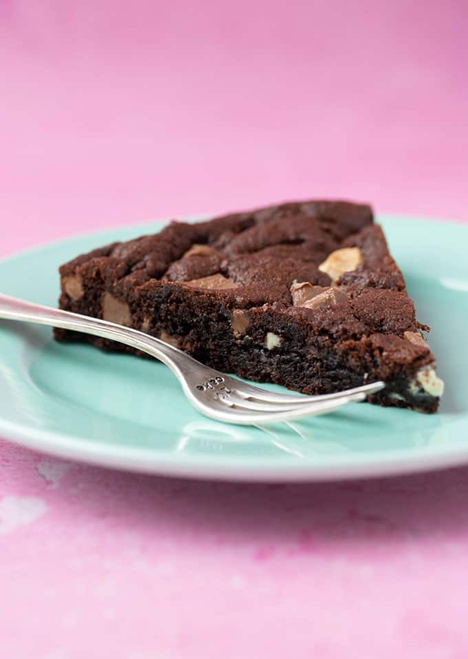 Close up of a slice of Triple Chocolate Cookie Cake