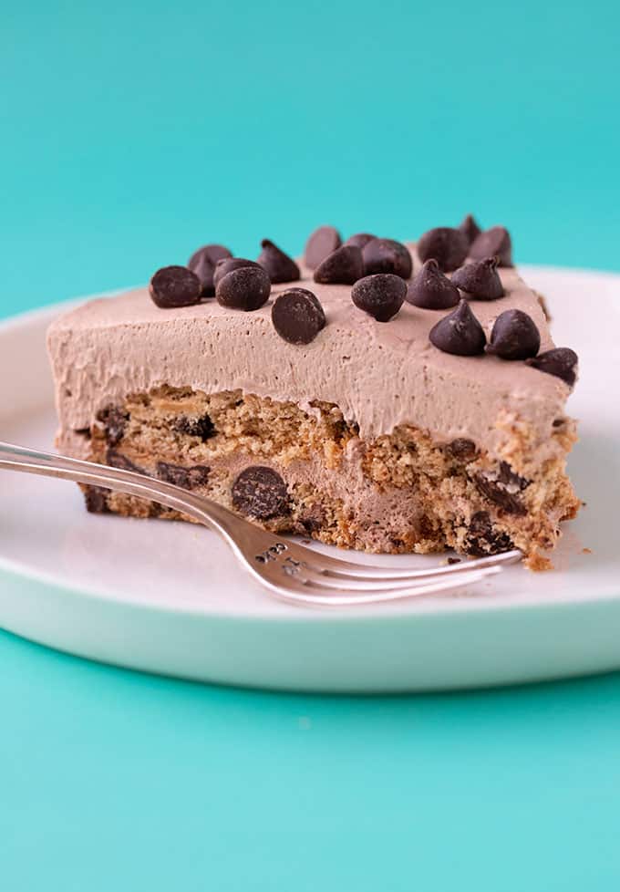 A slice of Chocolate Chip Cookie Icebox Cake on a white plate