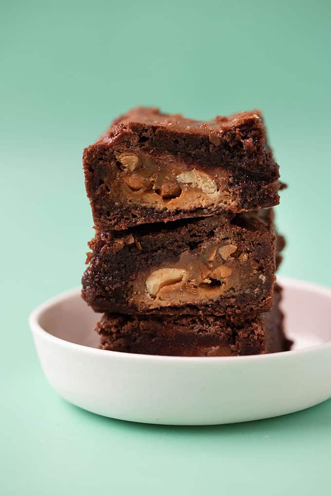 A stack of homemade Snickers Brownies