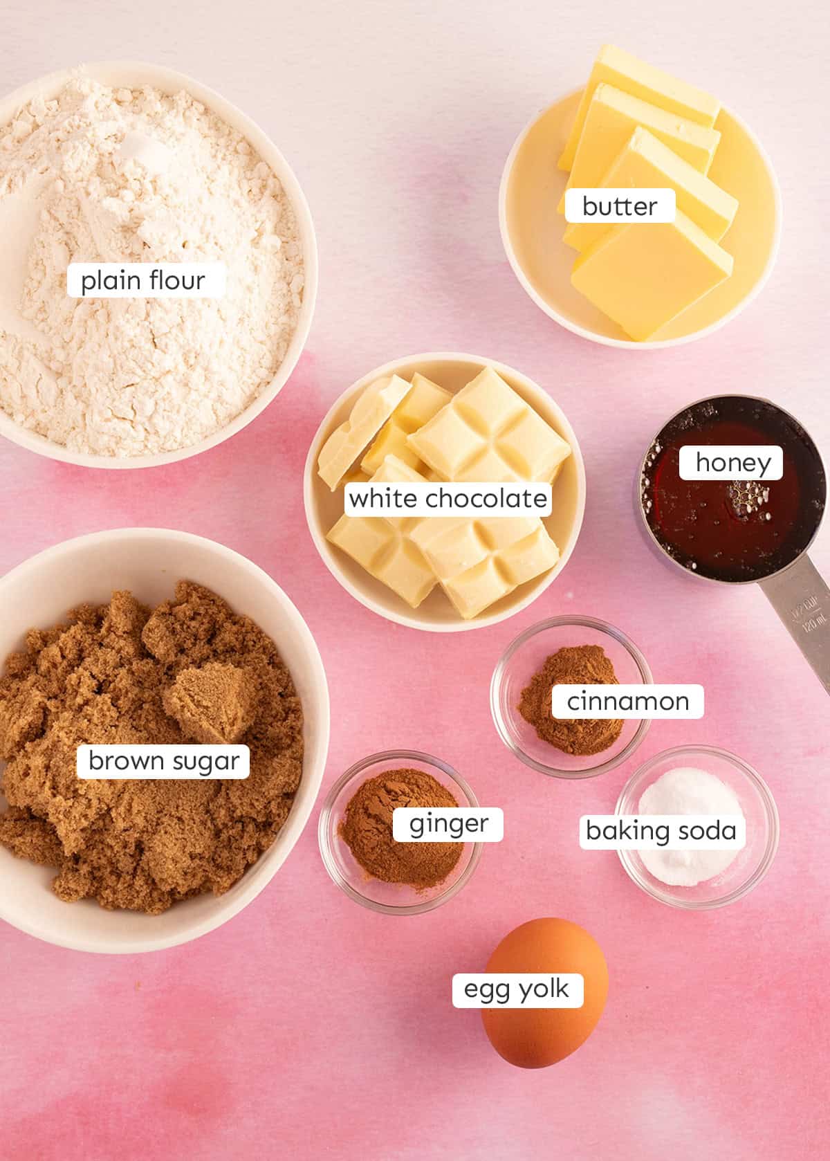 Top view of a bunch of ingredients needed to make Honey Cookies from scratch. 