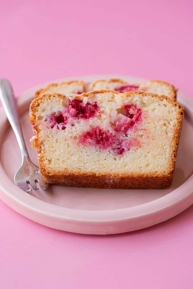 A pieces of Lemon Loaf on a pink plate