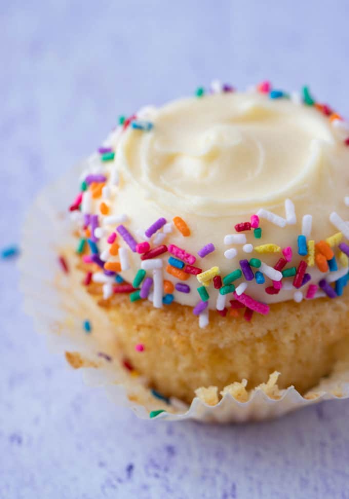 Close up of a Vanilla Cupcake topped with funfetti
