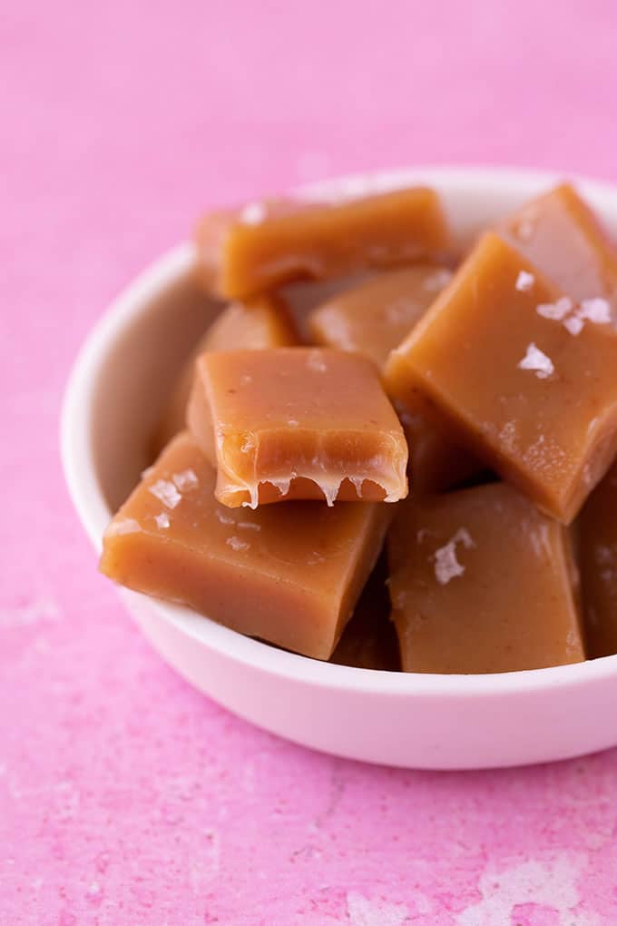 Homemade Salted Caramel Candy on a pink background