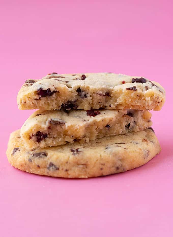 A small stack of Chocolate Cranberry Cookies broken in half