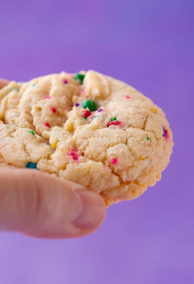 A hand holding a Cake Mix Cookie