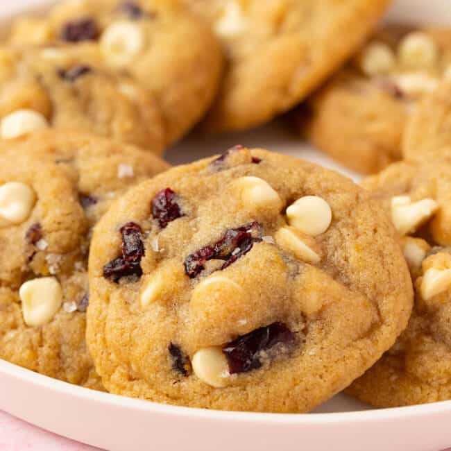 A plate of homemade white chocolate cranberry cookies.