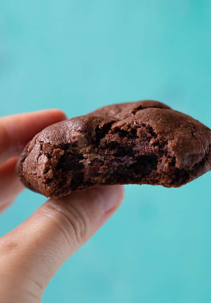 A hand holding a Chocolate Cake Mix Cookie